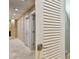 Hallway featuring tiled floors, recessed lighting, and closet at 3308 Landing Pl, Palm Harbor, FL 34684
