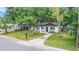 Beautiful home with manicured lawn, fresh landscaping, and a welcoming front entrance at 3812 W Rogers Ave, Tampa, FL 33611
