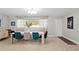 Inviting dining room with stylish seating, natural light and elegant decor at 4012 N Munro St, Tampa, FL 33603