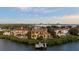 Stunning waterfront home with a private dock and beautiful landscaping in a desirable community at 4128 Causeway Vista Dr, Tampa, FL 33615