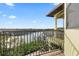 This house has a charming balcony with a stunning water view at 4128 Causeway Vista Dr, Tampa, FL 33615