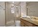 Elegant bathroom with walk-in shower and decorative stained glass at 4128 Causeway Vista Dr, Tampa, FL 33615