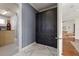 This closet features custom shelving, cabinets, and marble tile flooring at 4128 Causeway Vista Dr, Tampa, FL 33615