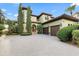 Charming two-story home with a paved driveway and two-car garage at 4128 Causeway Vista Dr, Tampa, FL 33615