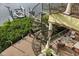 Exterior view of a waterfront home featuring a spiral staircase to the boat dock and deck area at 4128 Causeway Vista Dr, Tampa, FL 33615