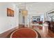 Elegant foyer with hardwood floors and an open view to the living room and dining area at 4128 Causeway Vista Dr, Tampa, FL 33615