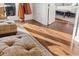 Hardwood floors leading from the living room to the bedroom at 4128 Causeway Vista Dr, Tampa, FL 33615