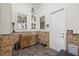 A convenient mudroom with tile flooring, built-in storage, and pet-friendly amenities at 4128 Causeway Vista Dr, Tampa, FL 33615