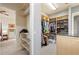 A well-organized walk-in closet with custom shelving, storage, and hanging space at 4128 Causeway Vista Dr, Tampa, FL 33615