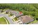 An aerial view of the home showcasing the property's location and surrounding lush green landscape at 4155 Barletta Ct, Wesley Chapel, FL 33543