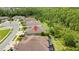 Aerial view showcasing the home's roof, backyard, and proximity to the surrounding community at 4155 Barletta Ct, Wesley Chapel, FL 33543