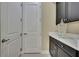A clean, neutral laundry room features white cabinets and doors, and a white countertop at 4155 Barletta Ct, Wesley Chapel, FL 33543