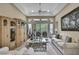 Bright living room with stylish furniture, decorative accents, and ample natural light at 4155 Barletta Ct, Wesley Chapel, FL 33543