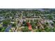 Charming neighborhood aerial view featuring tree-lined streets and proximity to waterfront, stores, and restaurants at 4714 W Vasconia St, Tampa, FL 33629