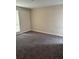 Comfortable bedroom with neutral walls, new carpet, and a window that offers plenty of natural light at 4793 Pleasant Ave, Palm Harbor, FL 34683