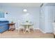 Dining area features wood flooring and an abundance of natural light at 4801 Airport Rd # 211, Zephyrhills, FL 33542
