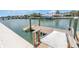 Private dock with boat lift provides direct access to the water for boating and water activities at 4900 Brittany S Dr # 611, St Petersburg, FL 33715