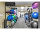 Versatile exercise room with fitness balls and weight machines for a comprehensive workout at 4900 Brittany S Dr # 611, St Petersburg, FL 33715