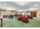 Bright lounge area with seating and tables perfect for social gatherings and relaxing indoors at 4900 Brittany S Dr # 611, St Petersburg, FL 33715
