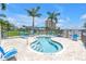 Community pool with ample seating provides a refreshing and social space for residents to enjoy at 4900 Brittany S Dr # 611, St Petersburg, FL 33715