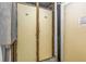 Community storage area with secure individual numbered lockers for residents' convenience at 4900 Brittany S Dr # 611, St Petersburg, FL 33715