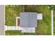 Overhead shot of the house and its surrounding landscape, showing the roof and yard at 4918 Stolls Ave, Tampa, FL 33615