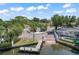 Community boat ramp featuring a new pier, convenient access to the waterfront, and lush landscaping at 4918 Stolls Ave, Tampa, FL 33615
