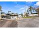 Street view of the neighborhood waterway with boat docks and a sign for boat parking area at 4918 Stolls Ave, Tampa, FL 33615