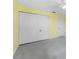 Bedroom featuring a wall closet and light yellow walls at 5377 Springwood Blvd, Pinellas Park, FL 33782