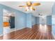 Living room view with tile floor into the kitchen and entry way; great open concept at 5377 Springwood Blvd, Pinellas Park, FL 33782