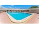 Outdoor pool area featuring bright blue water and lounge chairs around the perimeter at 5377 Springwood Blvd, Pinellas Park, FL 33782
