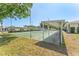 Well-maintained shuffleboard courts with covered walkways offer shade and recreation in a community setting at 5377 Springwood Blvd, Pinellas Park, FL 33782