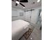Bedroom features a modern ceiling fan, sliding door, and contemporary design at 539 Freeport N Ave, St Petersburg, FL 33702