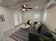 Cozy living room with ceiling fan, mini split AC and modern decor at 539 Freeport N Ave, St Petersburg, FL 33702