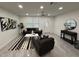 Tastefully decorated living room with tile flooring, neutral paint and modern ceiling fan at 539 Freeport N Ave, St Petersburg, FL 33702