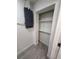 Small storage room with shelving and access to the electrical panel at 539 Freeport N Ave, St Petersburg, FL 33702