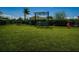 Beautifully maintained dog park with synthetic grass, seating and plenty of room to play at 589 52Nd N Ave, St Petersburg, FL 33703