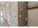 Hallway with neutral walls and multiple doors at 589 52Nd N Ave, St Petersburg, FL 33703