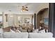 Spacious living room with a ceiling fan, recessed niche, and neutral-toned furnishings at 589 52Nd N Ave, St Petersburg, FL 33703