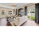 Bright living room with dark wood floors, neutral walls, recessed niche and sliding glass door at 589 52Nd N Ave, St Petersburg, FL 33703