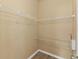 Spacious walk-in closet with wire shelving for organized storage solutions at 589 52Nd N Ave, St Petersburg, FL 33703