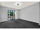 Spacious room with large sliding glass doors that offer a view of the backyard and lots of natural light at 6361 92Nd N Pl # 1704, Pinellas Park, FL 33782