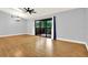 Spacious living room with sliding glass doors to the balcony and natural light at 6361 92Nd N Pl # 1704, Pinellas Park, FL 33782