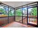 Relaxing screened porch with peaceful views of the lush greenery and tranquil water at 6361 92Nd N Pl # 1704, Pinellas Park, FL 33782