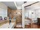 This spacious bathroom features a glass shower, soaking tub, and tasteful decorations at 6621 Appaloosa Dr, Tampa, FL 33625