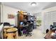 Bedroom featuring carpet, a desk and shelving unit, and ample room to relax at 6621 Appaloosa Dr, Tampa, FL 33625