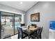 Cozy dining area with view of the pool and easy access to the outdoors for entertaining at 6621 Appaloosa Dr, Tampa, FL 33625