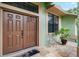 Close up of the double front doors and welcoming patio of this attractive home at 6621 Appaloosa Dr, Tampa, FL 33625