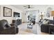 Comfortable living room with a ceiling fan and plenty of natural light at 6630 Spring Flower Dr # 14, New Port Richey, FL 34653