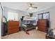 Comfortable bedroom featuring a bunk bed, two dressers, and natural light at 6645 Freeport Dr, Spring Hill, FL 34608
